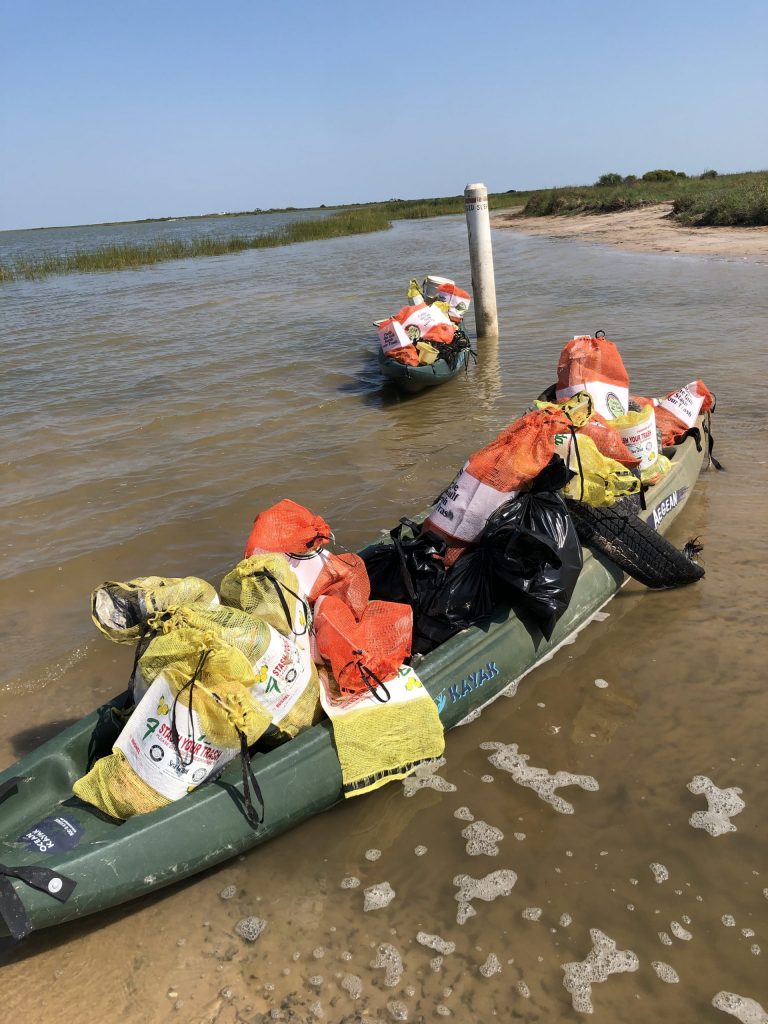 Ymca Group's Kayak Loads Of Trash